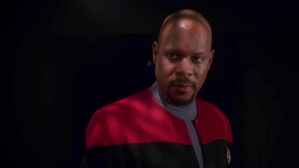 Benjamin Sisko looks off to the side in 'Star Trek: Deep Space Nine'