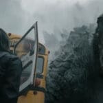 Godzilla roars in the direction of a school bus in 'Monarch: Legacy of Monsters'