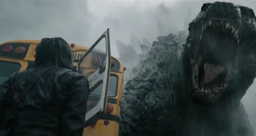 Godzilla roars in the direction of a school bus in 'Monarch: Legacy of Monsters'